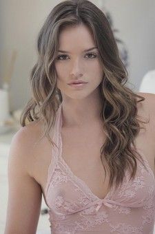 Yvana Playing On Bed